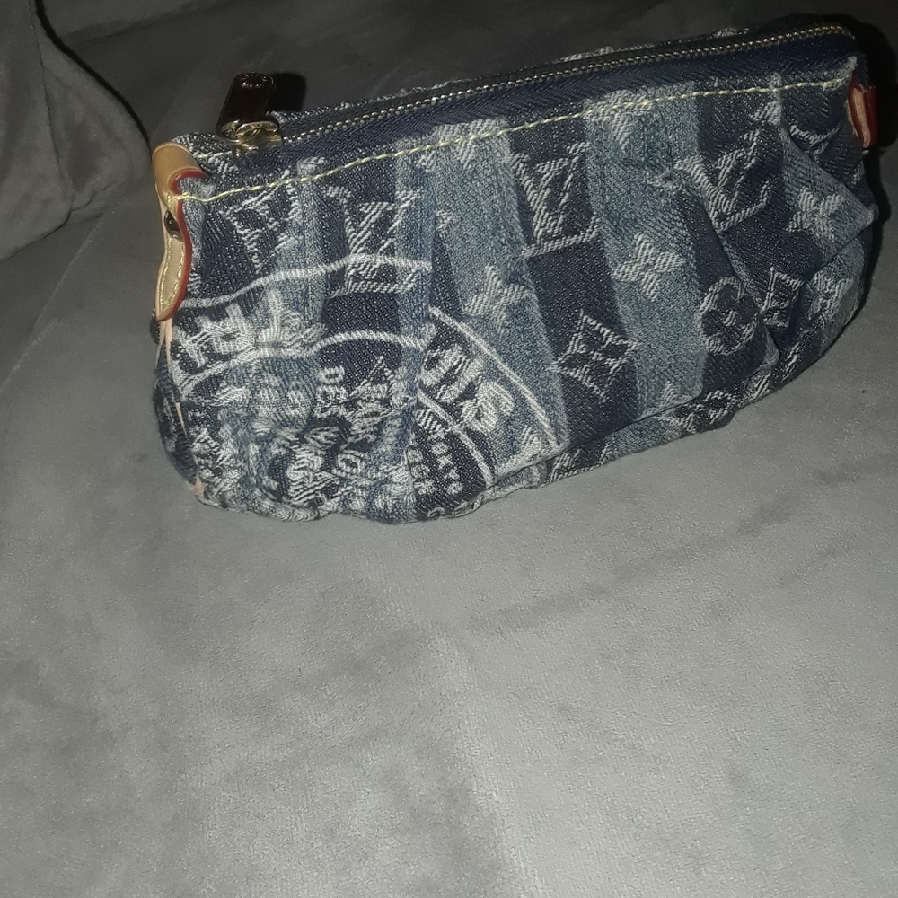 Authentic Louis Vuitton denim Trousse Raye pouch